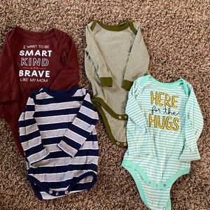 Bundle of 4 long sleeve onesie style shirts